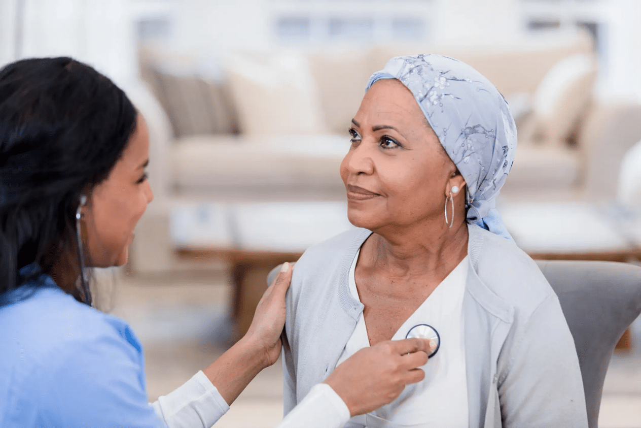 Nurse checking a resident's heart rate