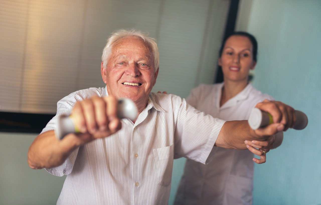 Older adults performing dumbbell exercises during outpatient therapy