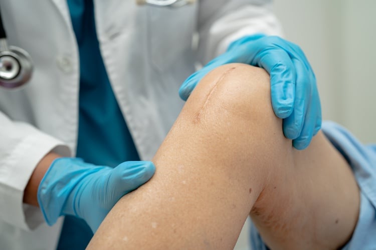 Clinician providing advanced wound care