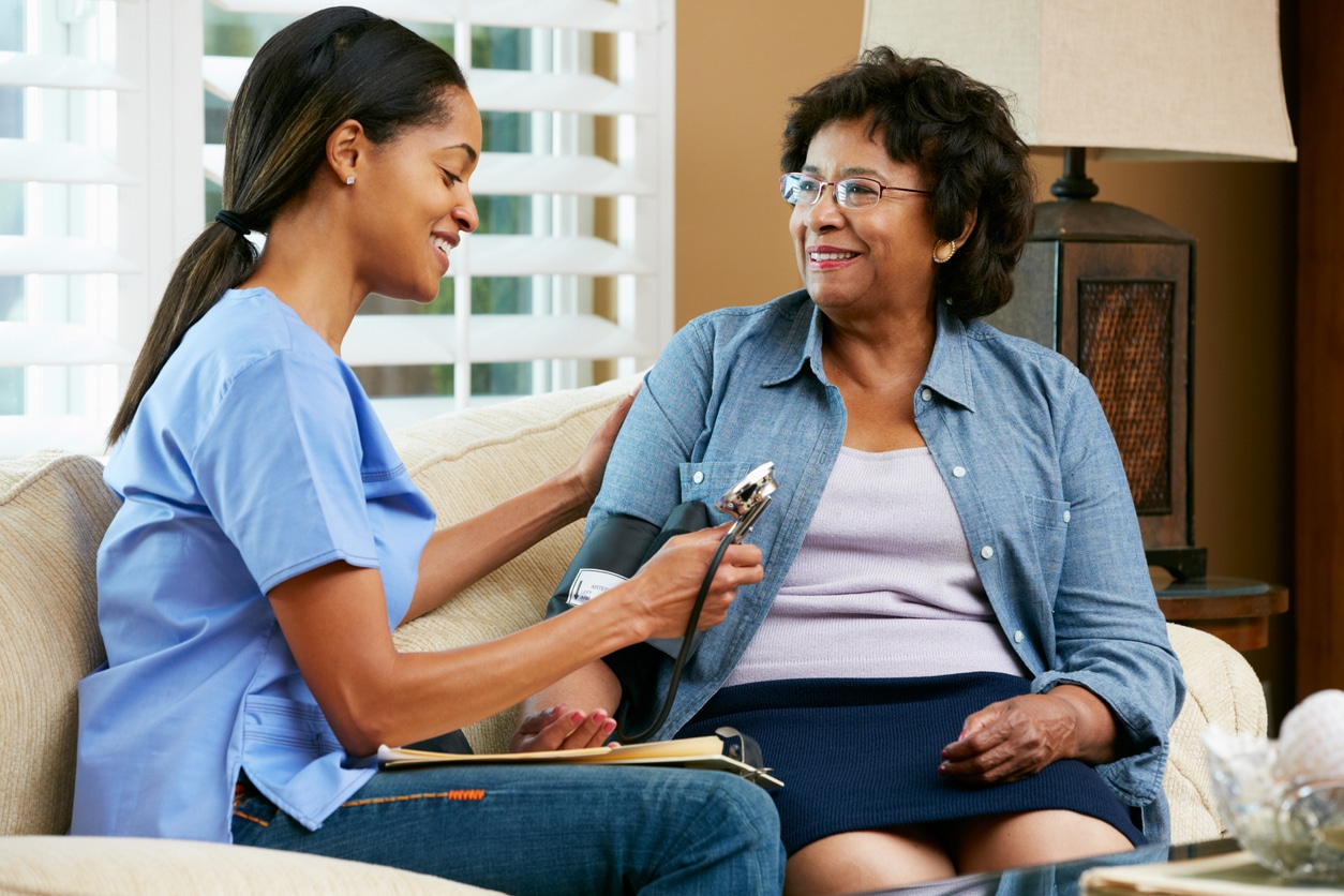 Rehabilitation nurse caring for a patient during recovery