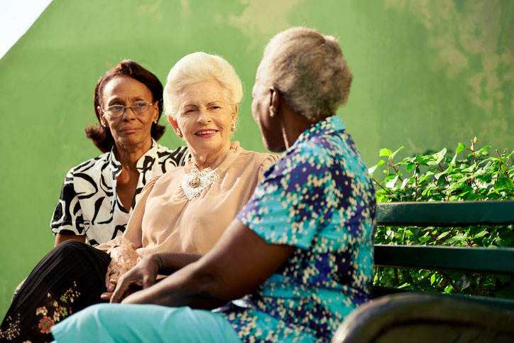 Senior women sitting on a bench at a skilled nursing facility in Shreveport, LA